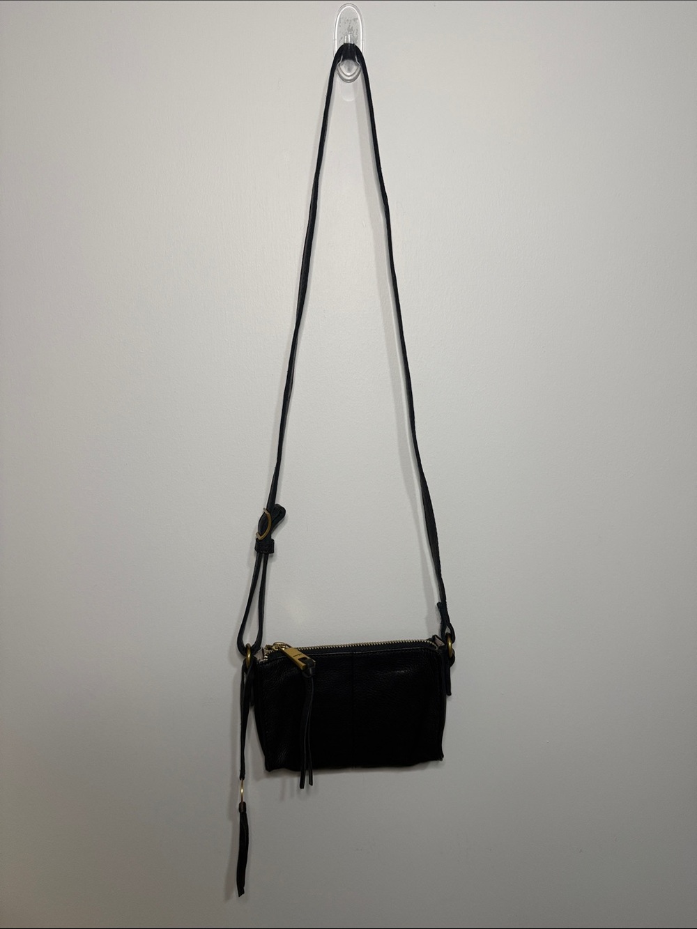 Minimalist Black Crossbody Bag with Gold Accents